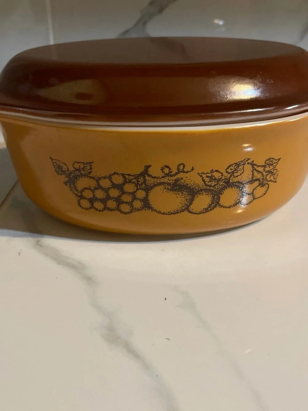 Pyrex Amber and Brown Covered Casserole with Fruit Motif